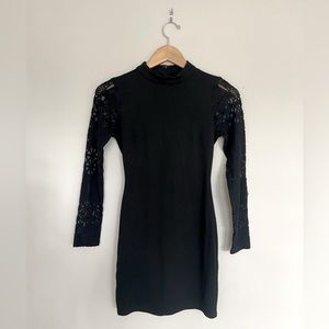 Lulu’s black lace up your sleeve bodycon dress! Size XS.
